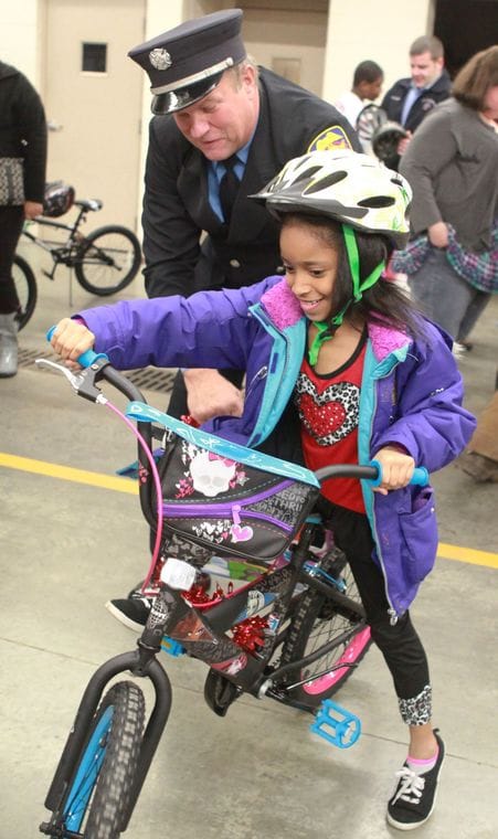 20 Bloomington Kids Receive New Bicycles